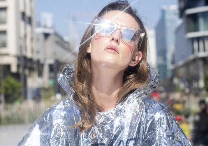 clothing apparel coat person human raincoat sunglasses accessories accessory