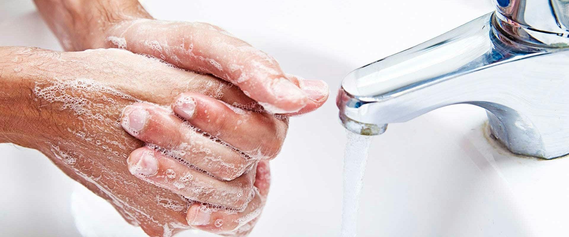 washing hand indoors