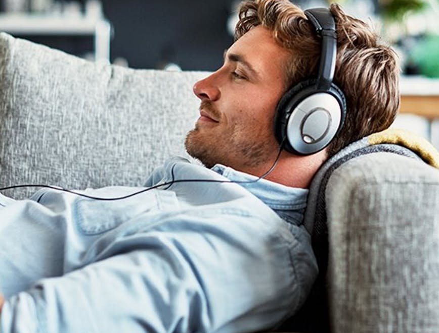 cushion person human headphones headset electronics video gaming