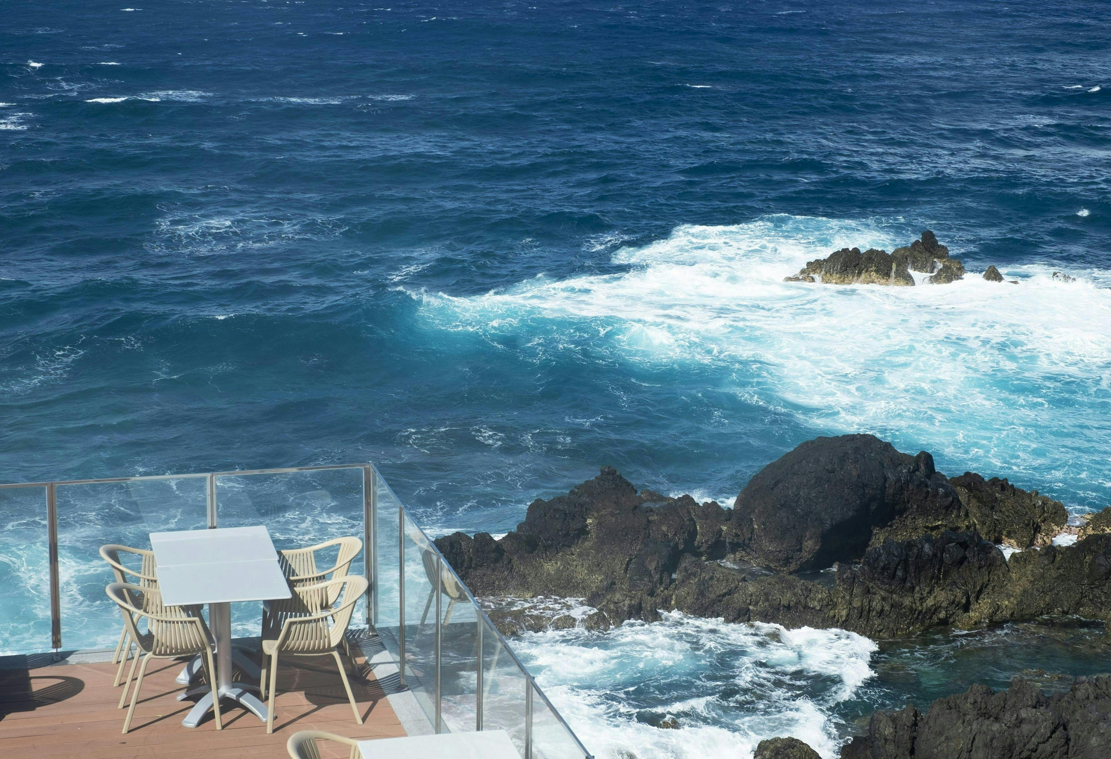chair furniture promontory sea ocean outdoors nature water sea waves
