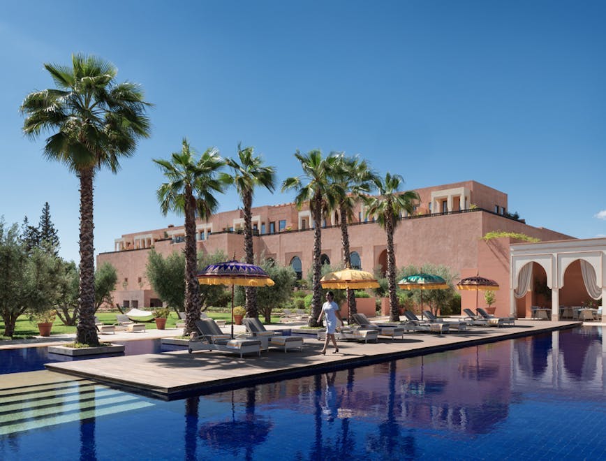 alan keohane morocco oberoi marrakech hotel building resort housing villa summer pool swimming pool tree person
