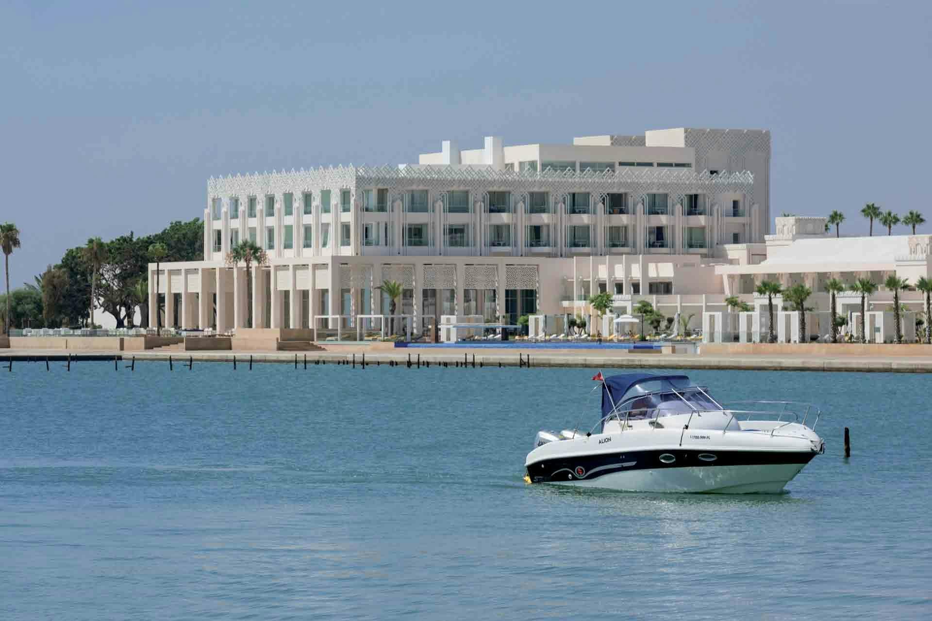 transportation vehicle yacht water waterfront boat architecture building office building city